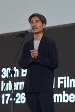 第30回釜山国際映画祭での「匿名の恋人たち」アウトドアグリーティングに参加した月川翔