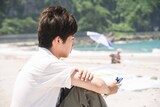 「旅と日々」場面写真。髙田万作演じる夏男
