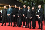第38回東京国際映画祭のレッドカーペットイベントの様子。左から川瀬陽太、大塚信一、原田琥之佑、菜葉菜、尾関伸次、大角英夫、山崎ハコ、菊地成孔