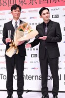 左から李相日、吉沢亮