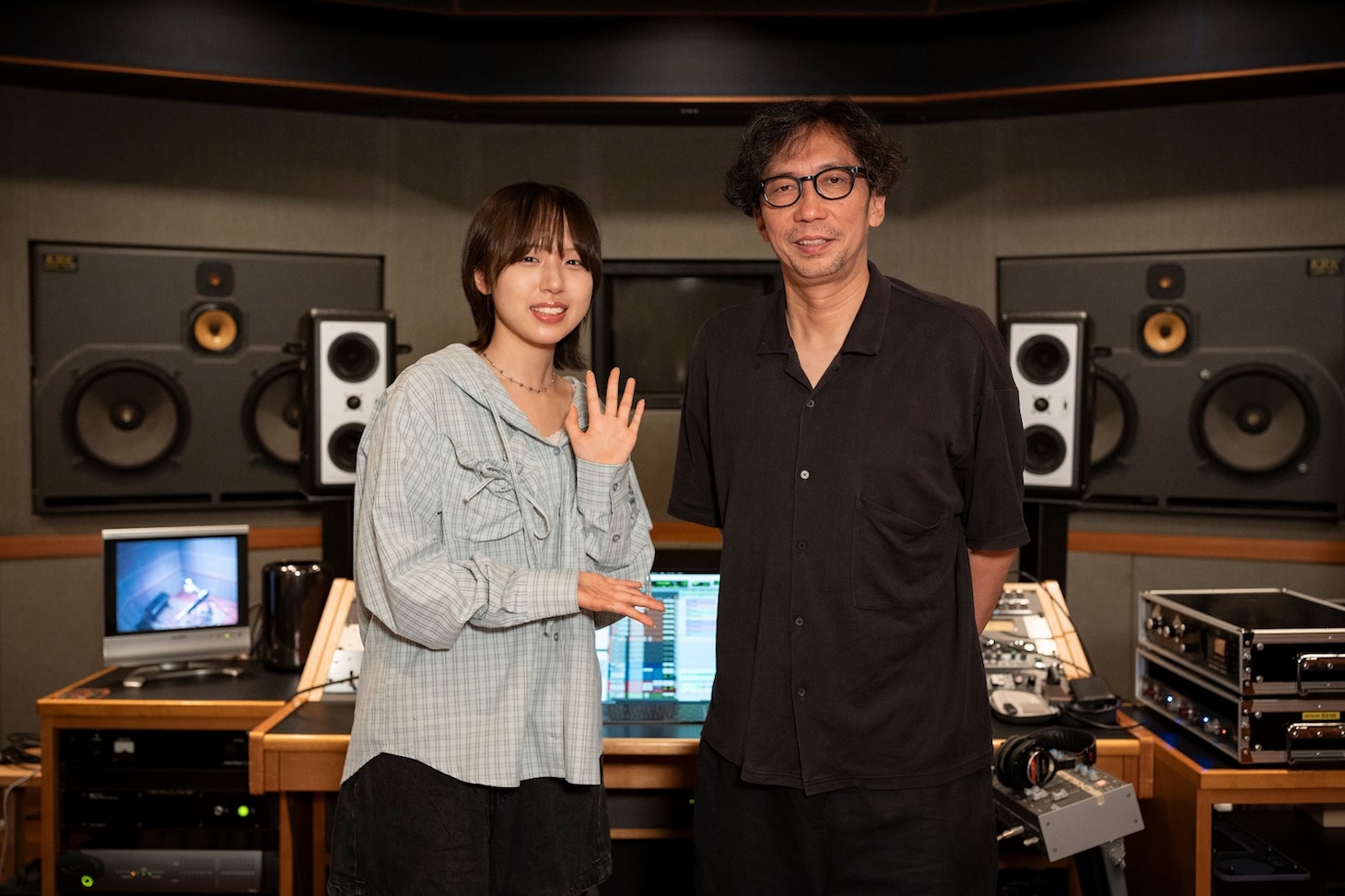 左から十明、行定勲