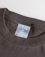 ＜IWAI SHUNJI The Film Works＞30th Anniversary Tシャツ SUMIKUROのタグ