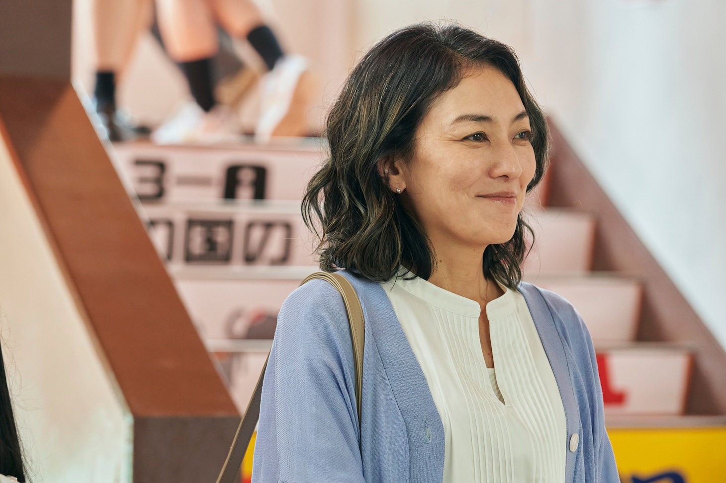 杉野梨花子役の板谷由夏