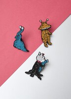 ナメゴンとカネゴンとギュスターヴくん（drawn by ヒグチユウコ）｜ピンズ3Pセット（税込3500円）©TSUBURAYA PROD. ©yuko higuchi