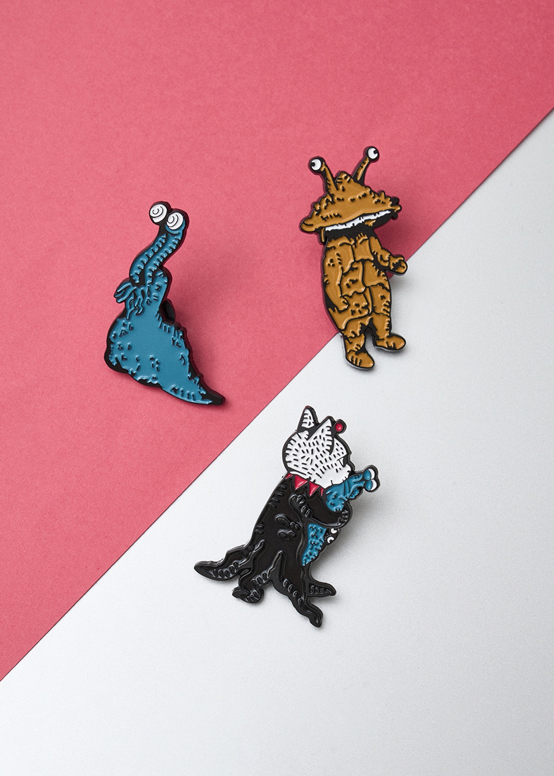 ナメゴンとカネゴンとギュスターヴくん（drawn by ヒグチユウコ）｜ピンズ3Pセット（税込3500円）©TSUBURAYA PROD. ©yuko higuchi