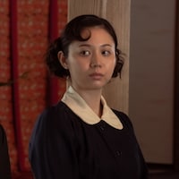 Netflixシリーズ「地獄に堕ちるわよ」場面写真。金澤美穂演じる細木幸子