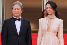 2022年の第75回カンヌ国際映画祭にて、左からパク・チャヌク、タン・ウェイ （写真提供：Boyer David / ABACA / Newscom / ゼータ イメージ）