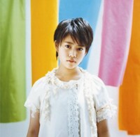 みつきは堂島孝平の書き下ろし曲「キズナ」で初の作詞にチャレンジしている（写真はアルバム「COLOR」ジャケット）。