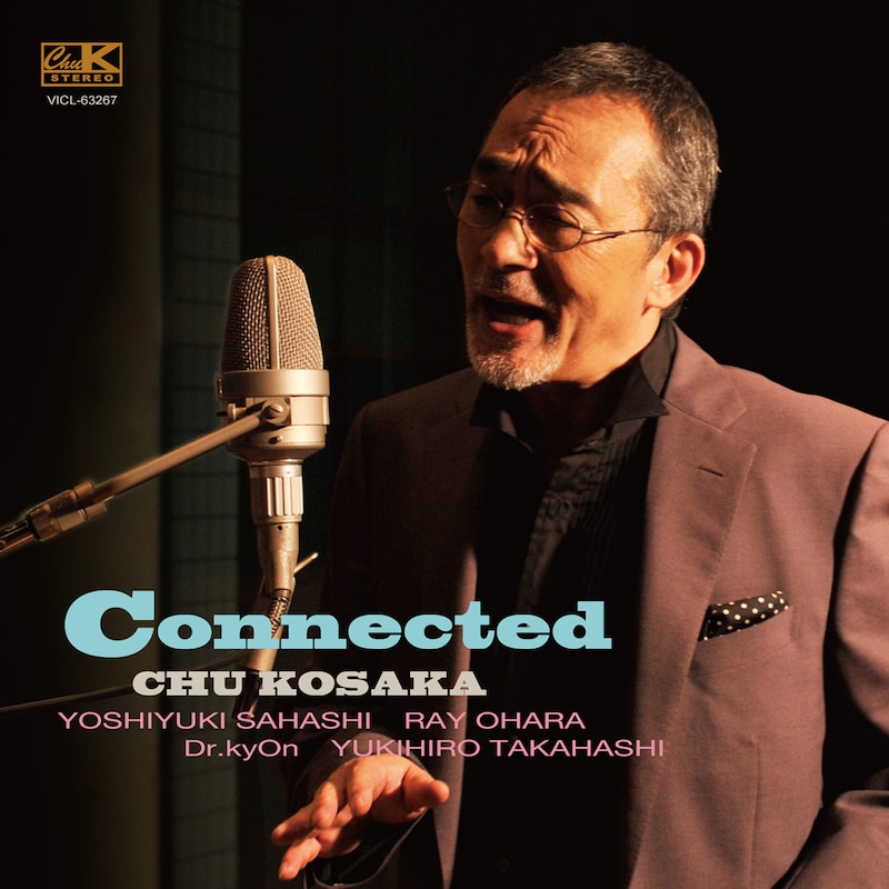 ジャケット写真は熱唱する小坂忠。