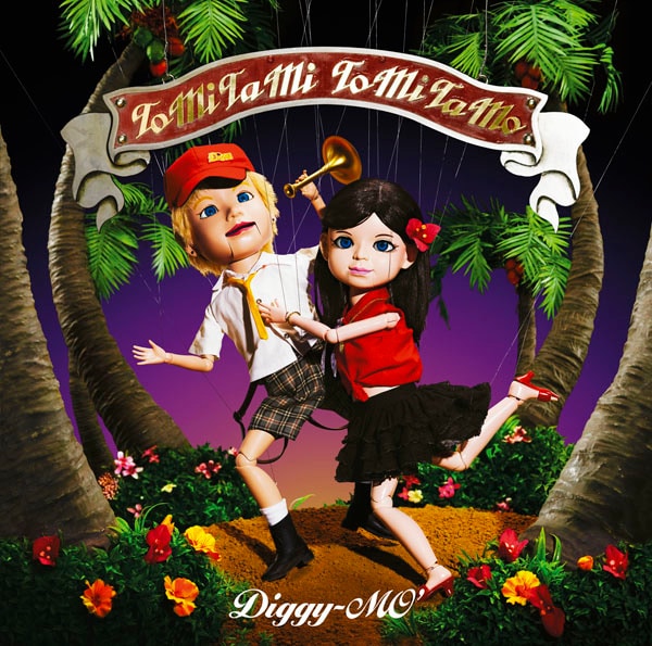 ニューシングル「ToMiTaMi ToMiTaMo」（写真）のタイトルは、ジャケットに登場するキャラクター、ToMiTaMi（♂／写真左）とToMiTaMo（♀／右）にちなんでおり、2人は同曲のビデオクリップにも登場。この夏限定で、ブログ「"ToMiTaMi"と"ToMiTaMo"の夏休み限定ブログ」もスタートさせた。