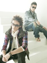 「ヒルクライム」の語源は、デビュー前にTOC（写真左）とDJ KATSUが共同生活していた家が丘の上にあったことから。毎日小高い丘を往復しながら、仕事や楽曲制作に励んでいた。