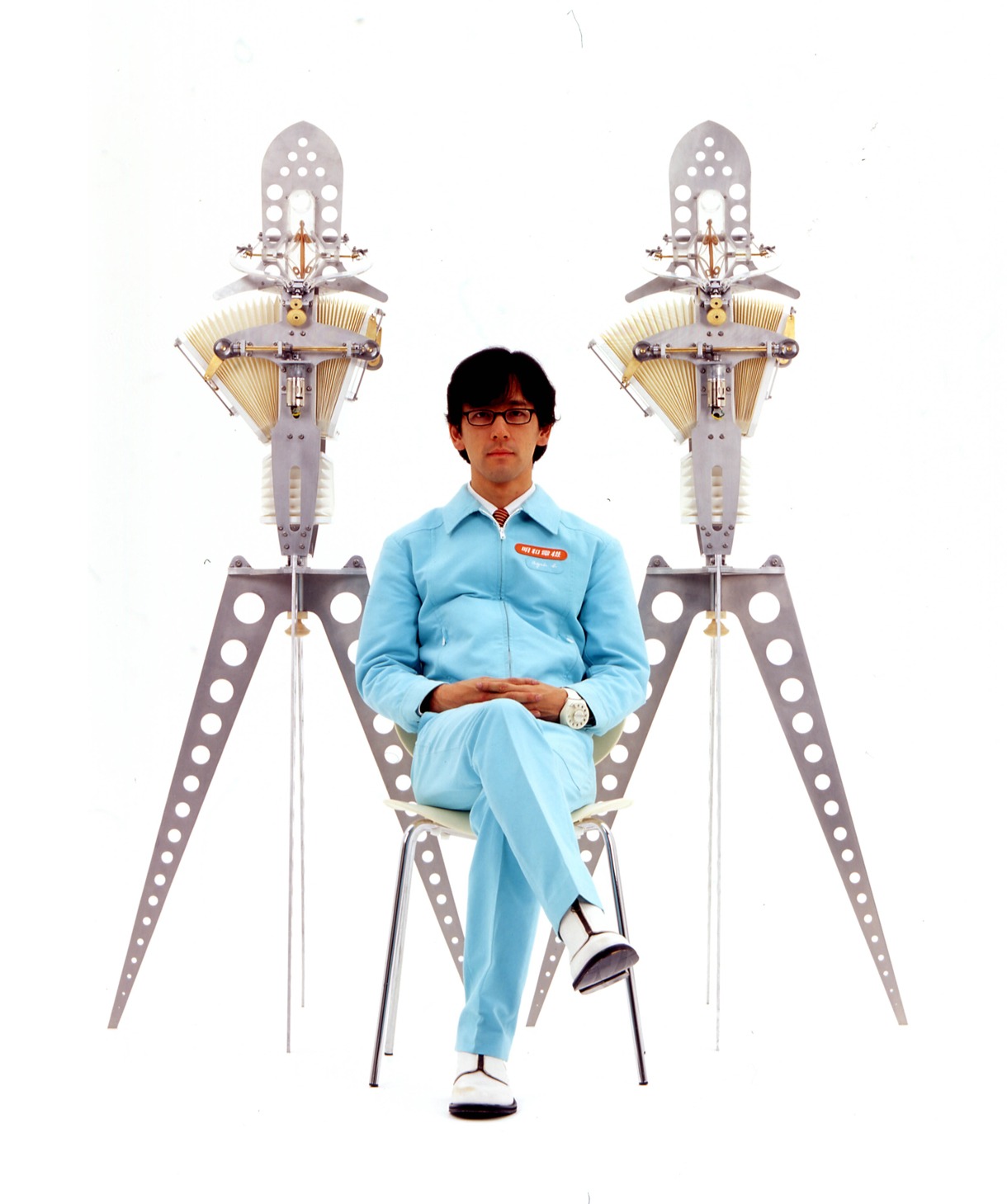 明和電機