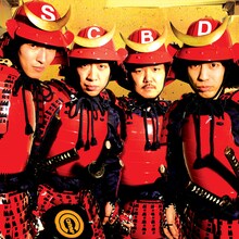 SCOOBIE DOのベストアルバム「Road to Funk-a-lismo! -BEST OF SPEEDSTAR YEARS-」には現在でもライブのレパートリーとして披露されているナンバーを中心に、初CD化となる音源も加えた全20曲が収録される。