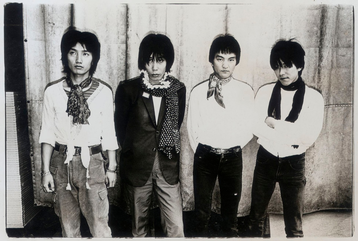 写真は1980年代のリザード（撮影：地引雄一）。オフィシャルMySpaceでは最新アルバム「リザードIV」収録のナンバー「ロンサム・ルシファー」が試聴可能だ。