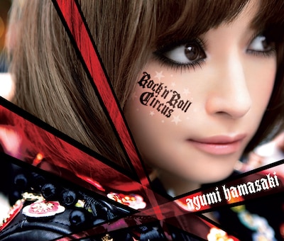 写真は、初回出荷分が直筆歌詞の封入対象となるアルバム「Rock'n'Roll Circus」のDVD付き仕様ジャケット。撮影を行ったロンドンの空気感や、アルバム全体に漂うロックな雰囲気を前面に打ち出したデザインとなっている。