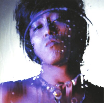 「パラシュート★ガール」は1992年に16枚目のシングルとしてリリース。1995年発売のアルバム「禁じられた生きがい」（写真）に収録された。