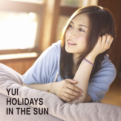 写真はアルバム「HOLIDAYS IN THE SUN」初回限定盤ジャケット。