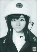 「三億円少女」フライヤーやポスターに掲載されているモンタージュ写真。清水佐紀の右前髪と頬、徳永千奈美の左目、嗣永桃子の顎、菅谷梨沙子の右目、夏焼雅の鼻、熊井友理奈の口、須藤茉麻の眉毛と左前髪と頬を合成している。