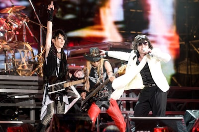 HEATH（写真左）、TAIJI（写真中央）、ToshI（写真右）。TAIJIが登場すると場内は絶叫に近い大歓声に包まれた。