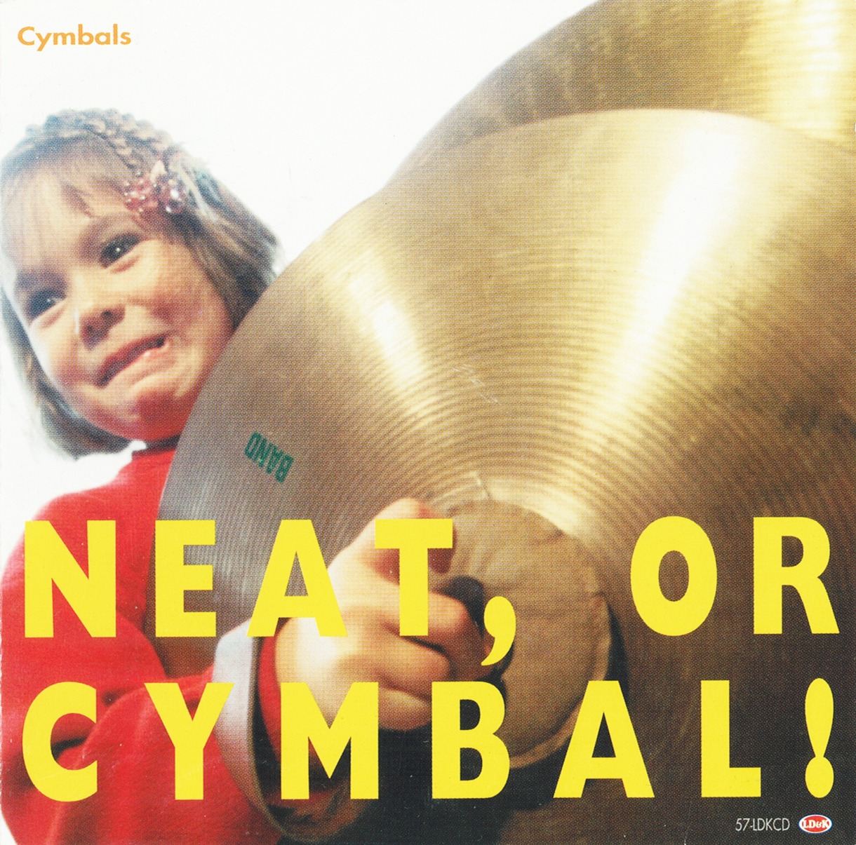 Cymbalsは現在ソロで活動中の土岐麻子とFROGの沖井礼二、プロデューサーとして活躍している矢野博康の3人によるバンド。コンピ収録曲「I'm a Believer」は1stミニアルバム「NEAT, OR CYMBAL!」（写真）から。