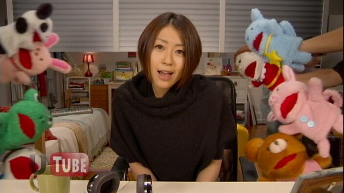 写真は「Goodbye Happiness」PVのワンシーン。なお、レコチョクでは明日11月10日より同曲の着うたフルの配信がスタートする。