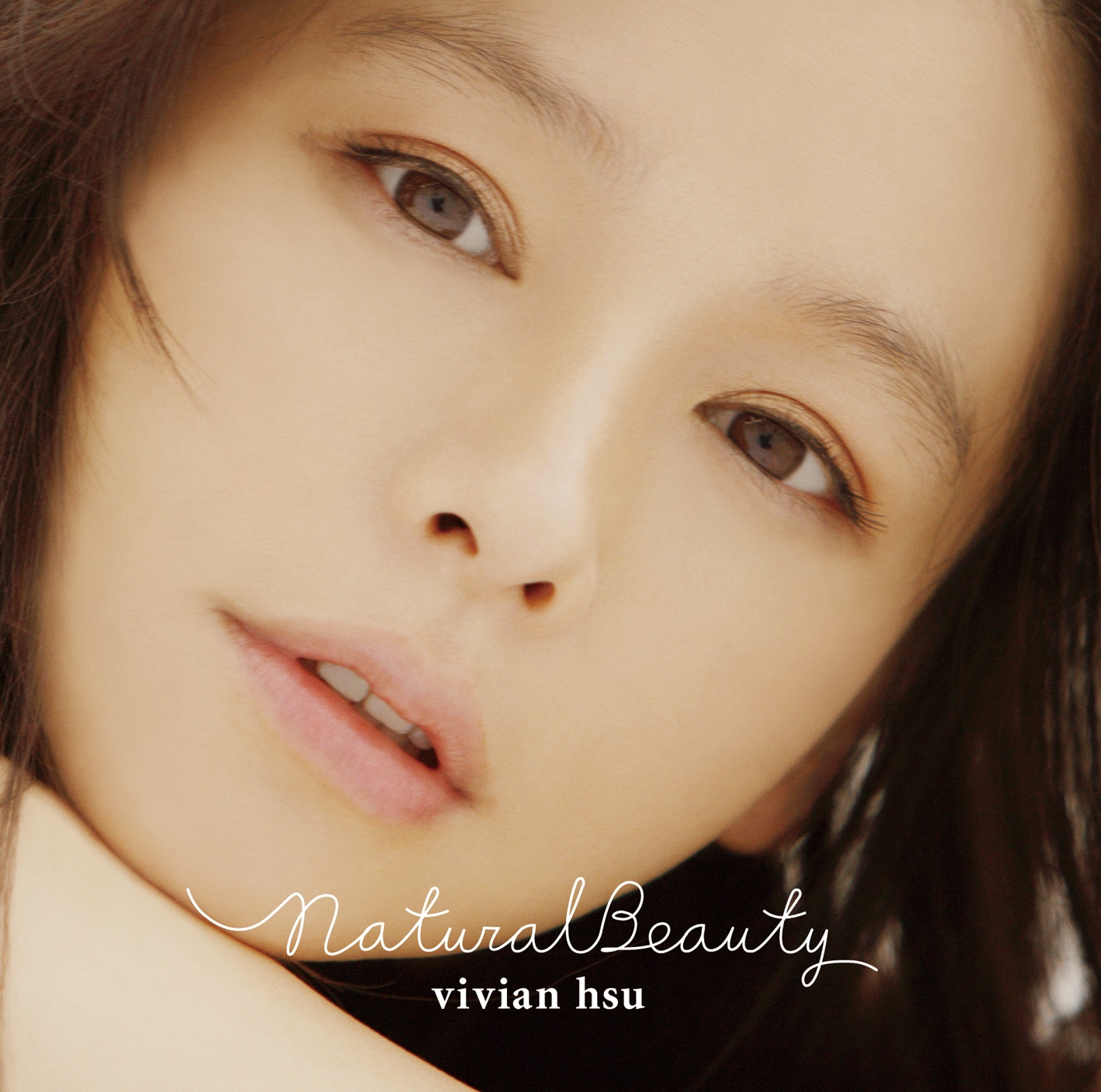 写真はアルバム「Natural Beauty」通常盤ジャケット。