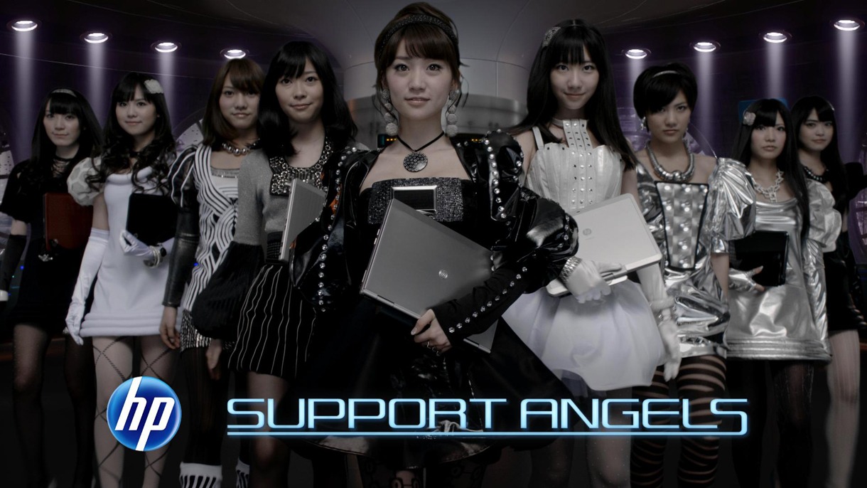写真はHP新CM「HP SUPPORT ANGELS starring AKB48」より。9人の「HP サポートエンジェル」たち。