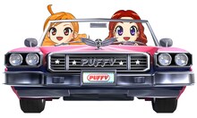 自動車に乗るPUFFYキャラクター