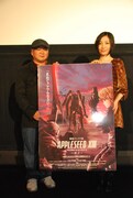 「アップルシードXIII」オフィシャルサイトでは藤咲淳一(写真左)による全5回の連載コラム「なぜなにアップルシードXIII !!」が掲載されている。
