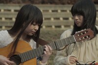 映画「恋はパレードのように」からの1シーン。