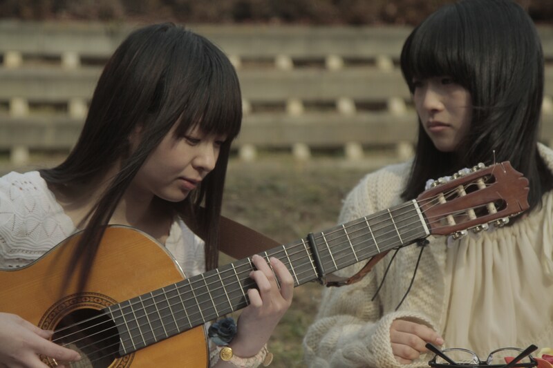 映画「恋はパレードのように」からの1シーン。