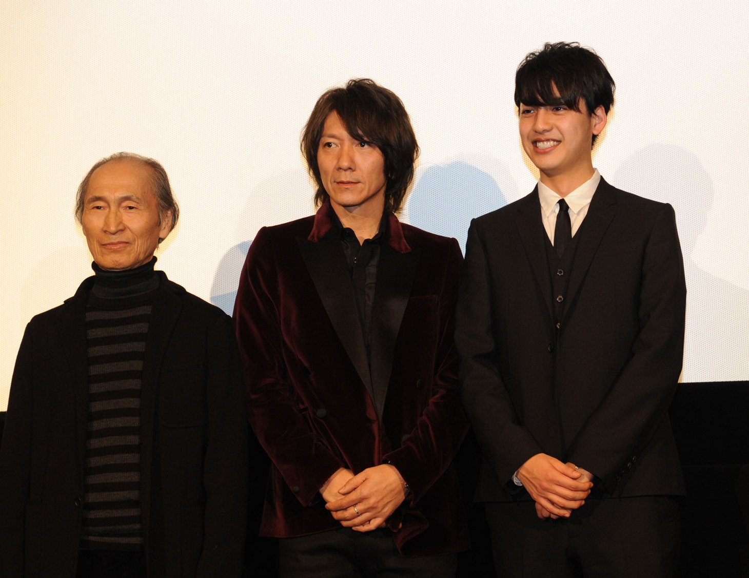 「YOSHII CINEMAS」舞台挨拶に登壇した品川徹（写真左）、吉井和哉（中央）、大野拓朗（右）。