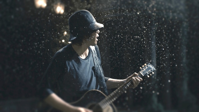 「PENTAX K-50」の新CM「ストリートライブ編」のワンシーン。