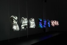 Perfumeが「Spring of Life」パフォーマンスにおいて着用したLED内蔵型の衣装。左から、同曲のビデオクリップ、「MTV VMAJ 2012」、「第63回NHK紅白歌合戦」のために制作されたもの。