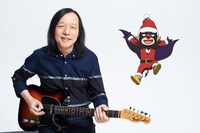 左から山下達郎、デビクロくん。