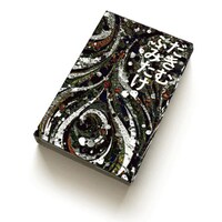 Dakim / Fumitake Tamura (Bun)「Mudai / むだい」カセットテープのパッケージイメージ。