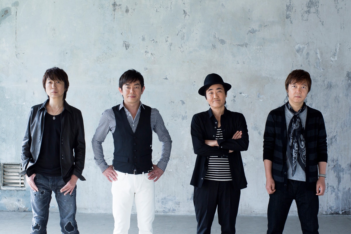 THE BOOM。左から小林孝至（G）、宮沢和史（Vo）、栃木孝夫（Dr）、山川浩正（B）。