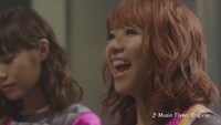 「755」CMのE-girlsバージョンのワンシーン。