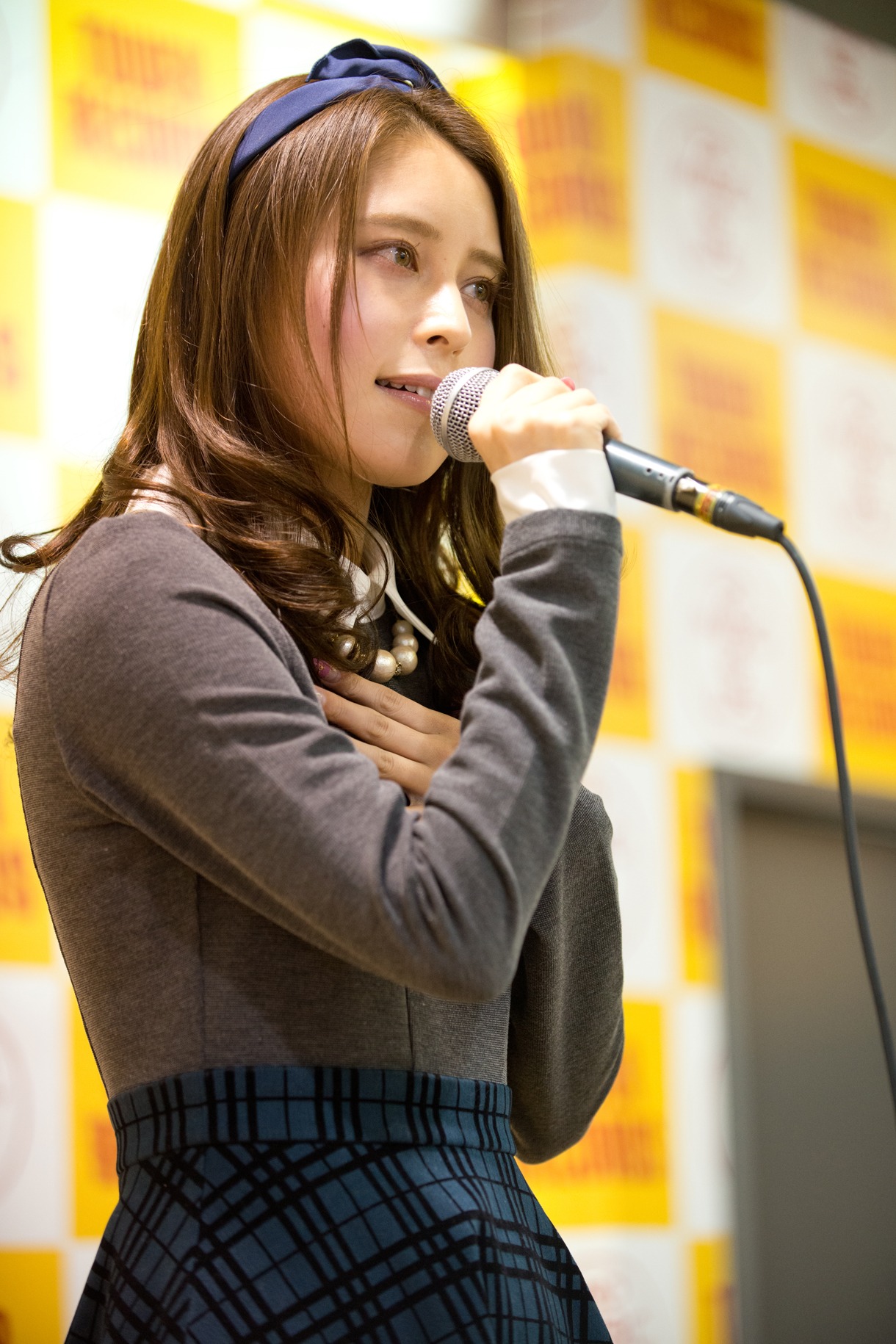 西恵利香によるミニライブの様子。