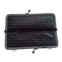 sukekiyo「PERSUASIO // 2015.2.28 sukekiyo 2015 live「The Unified Field」-VITIUM-」京公式オンラインストア豪華盤付属のがま口バッグデザイン。