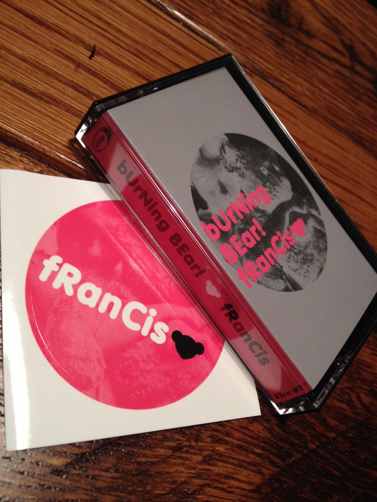 Francis「"BURNING BEAR!" cassette edition」と特典のステッカー。