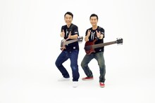 「ヤー！」を決める中村正人と肥後克広。