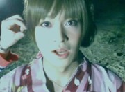 「SE7EN」ミュージックビデオより淀川由浩の女装姿。