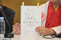 なぜか港カヲルが描いた、バイト君の新妻「まきさん」の似顔絵。