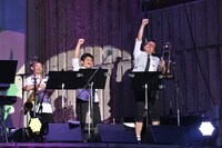 NEGiBANDホーン隊。左から永田こーせー、真砂陽地、前田大輔（写真は8月16日に行われたNegiccoワンマンライブ「Negicco at 日比谷野外音楽堂 Road of Negiiiiii ～Negicco One Man Show～ 2015 Summer」出演時の様子）。