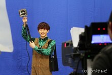 照明さんに扮したタクヤ。