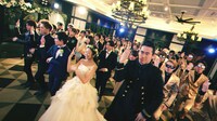 人気画像9位は「三代目JSB小林、岩田、登坂が結婚披露宴にサプライズ登場」より、「ポッキー」新CM「ウェディング」篇のワンシーン。