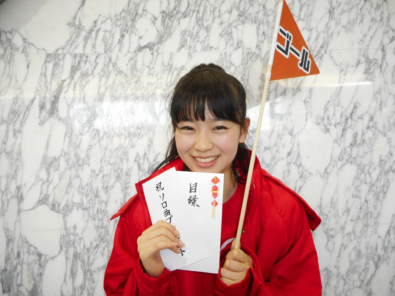 1位でゴールし、ソロ曲を獲得した坂井仁香。（提供：スターダストプロモーション）