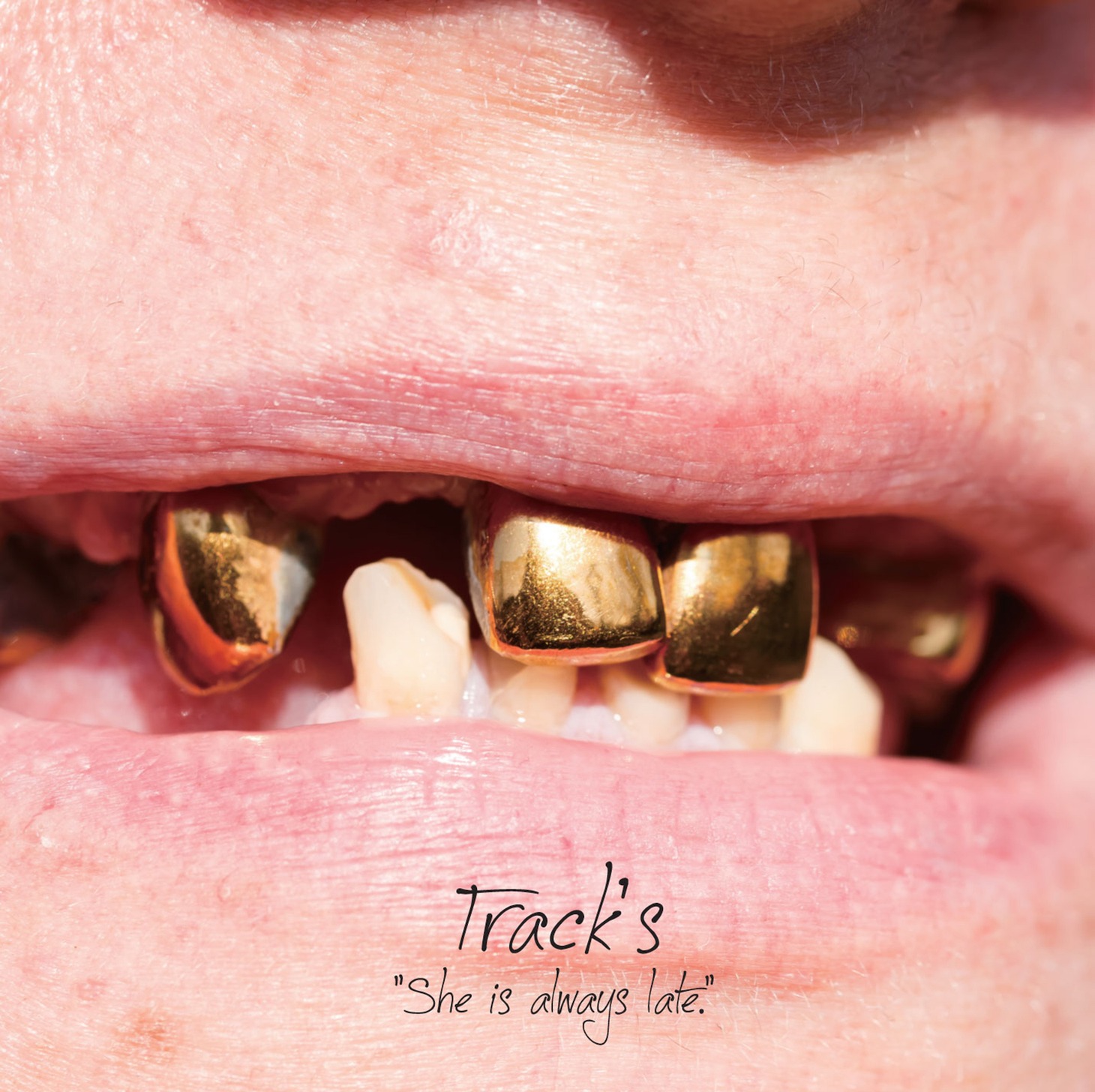 Track's「She is always late.」ジャケット