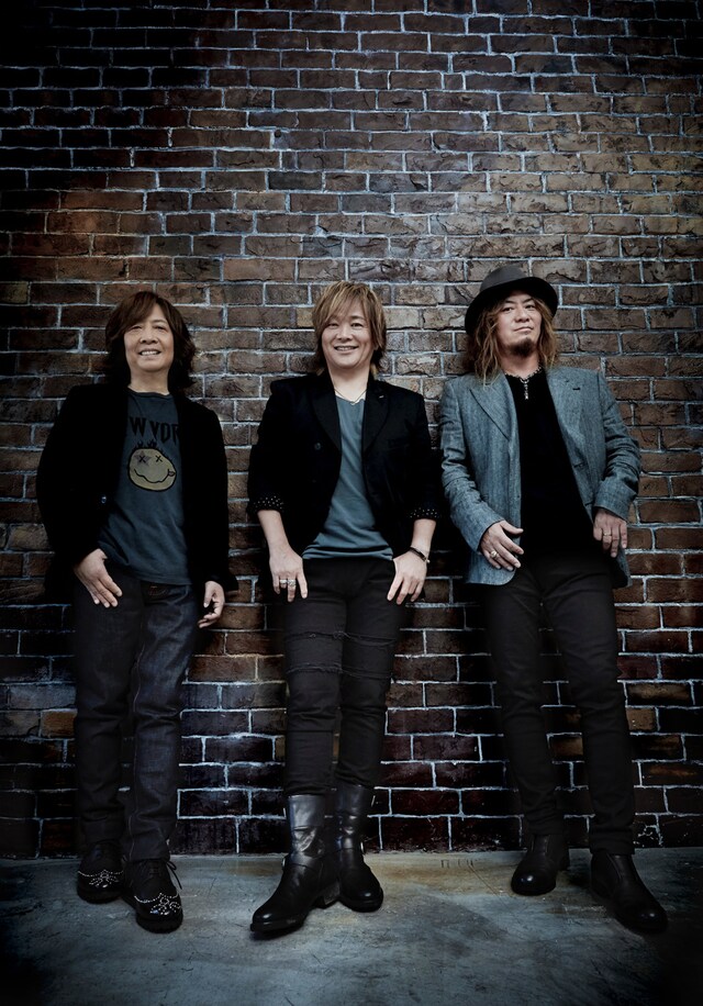 LAZY。左から井上俊次（Key）、影山ヒロノブ（Vo）、高崎晃（G）。